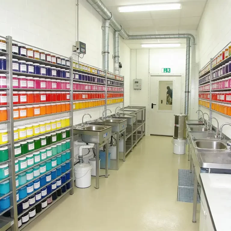 Organised spray booth with fixed areas for tools and materials